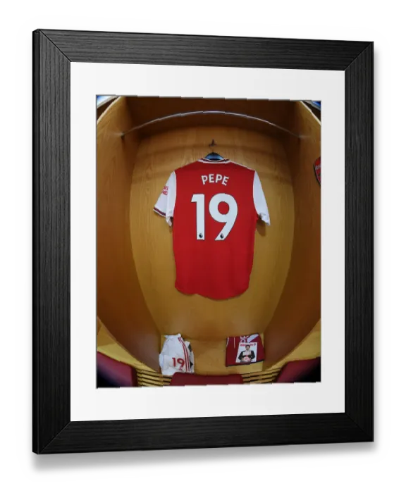 Framed Print : Arsenal FC vs Chelsea FC: Pre-Match Atmosphere - Nicolas Pepe's Jersey in Arsenal Changing Room (Arsenal v Chelsea 2019-20) Framed Print : Arsenal FC vs Chelsea FC: Pre-Match Atmosphere - Nicolas Pepe's Jersey in Arsenal Changing Room (Arsenal v Chelsea 2019-20)