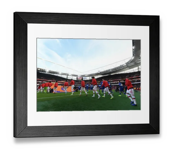 Framed Print : Arsenal team walks out before the match Framed Print : Arsenal team walks out before the match