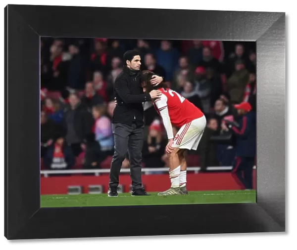 Arsenal's Mikel Arteta Embraces Matteo Guendouzi Amidst Intense Arsenal v Chelsea Rivalry (2019-20)