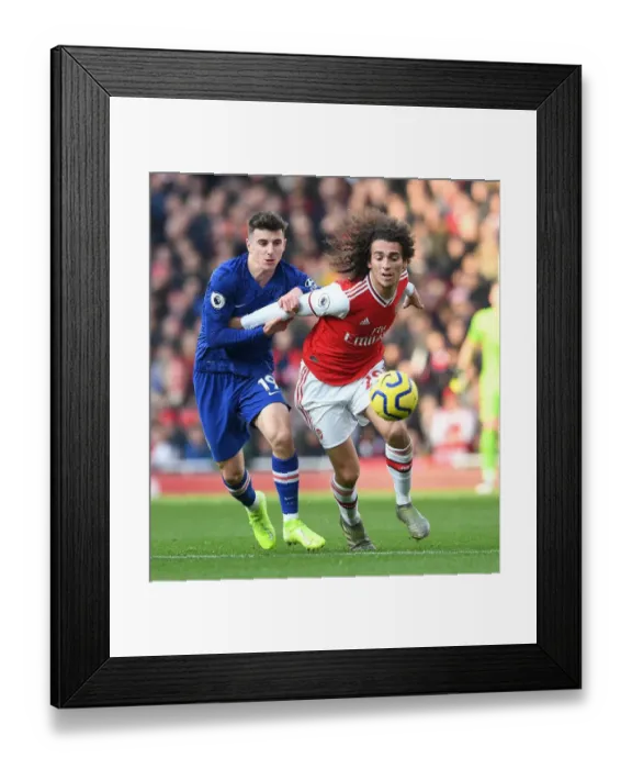 Framed Print : Guendouzi vs. Mount: A Premier League Showdown at Emirates Stadium Framed Print : Guendouzi vs. Mount: A Premier League Showdown at Emirates Stadium