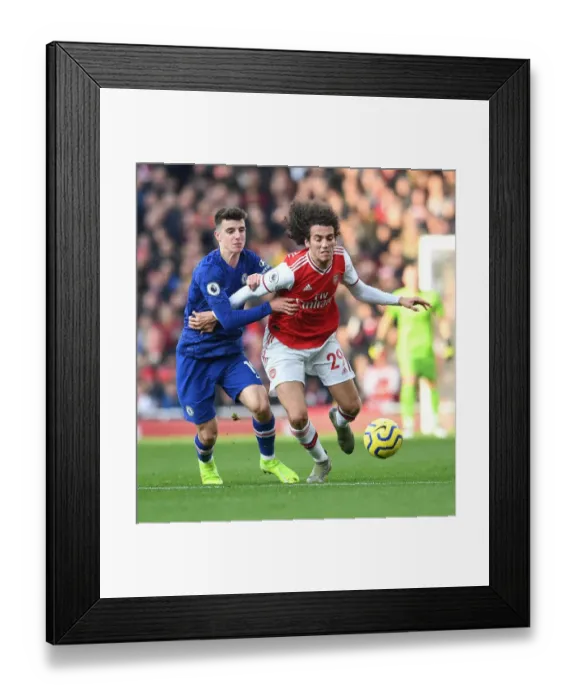 Framed Print : Arsenal vs. Chelsea: Intense Battle Between Guendouzi and Mount in the Premier League Framed Print : Arsenal vs. Chelsea: Intense Battle Between Guendouzi and Mount in the Premier League