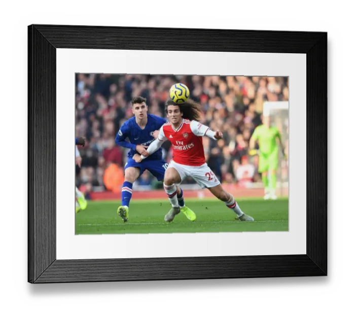 Framed Print : Guendouzi vs. Mount: Intense Rivalry on the Emirates Field