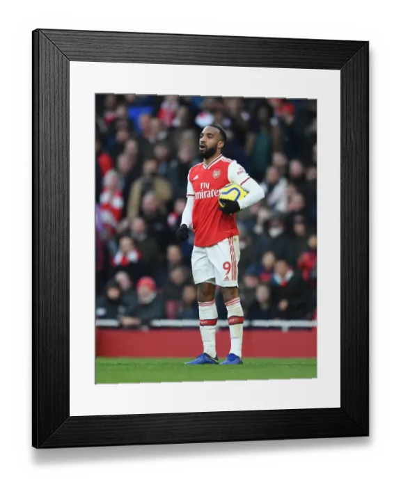 Framed Print : Arsenal's Lacazette Faces Off Against Chelsea in Intense Premier League Showdown