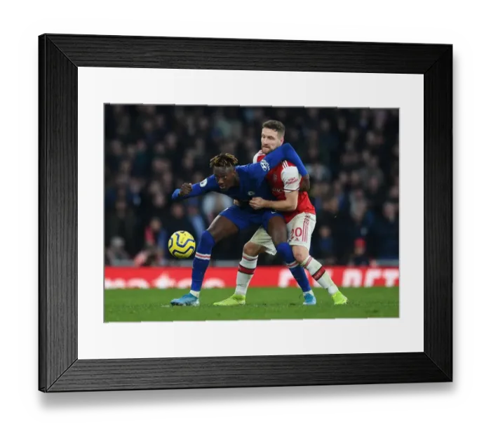 Framed Print : Arsenal vs. Chelsea: Mustafi vs. Abraham - Premier League Clash at Emirates Stadium (December 2019)