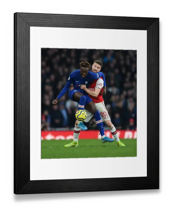 Framed Print : Mustafi vs. Abraham: A Premier League Showdown - Arsenal vs. Chelsea (December 2019), Emirates Stadium