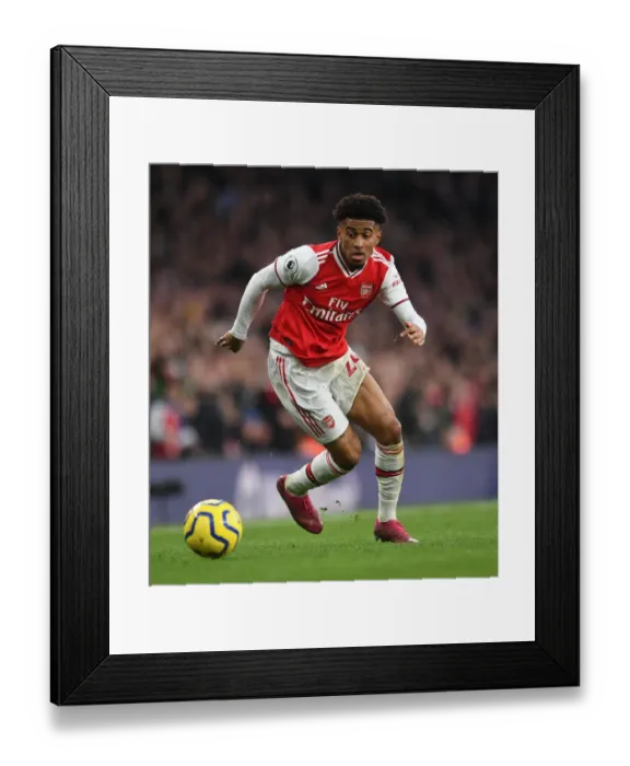 Framed Print : Arsenal's Nelson Faces Off Against Chelsea in Premier League Clash at Emirates Stadium Framed Print : Arsenal's Nelson Faces Off Against Chelsea in Premier League Clash at Emirates Stadium