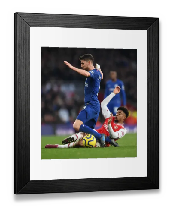 Framed Print : Arsenal vs. Chelsea: Nelson Tackles Jorginho in Intense Premier League Clash (2019-20)