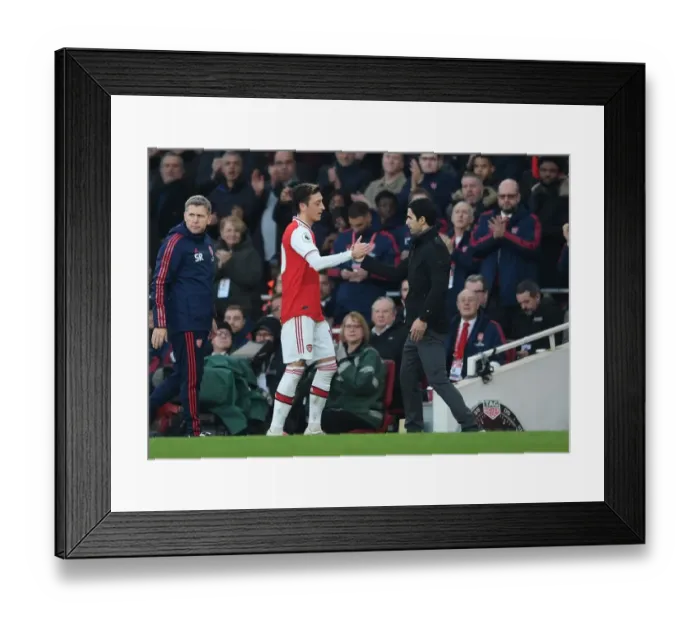 Framed Print : Arsenal's Mikel Arteta and Mesut Ozil Share a Moment Amidst Arsenal FC vs Chelsea FC Rivalry, Premier League 2019-20
