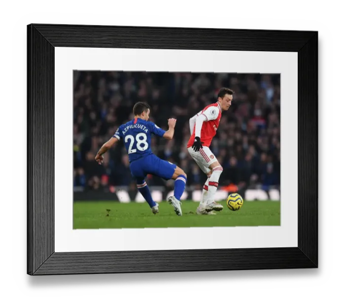 Framed Print : Arsenal vs. Chelsea: Ozil vs. Azpilicueta - Intense Battle in the Premier League