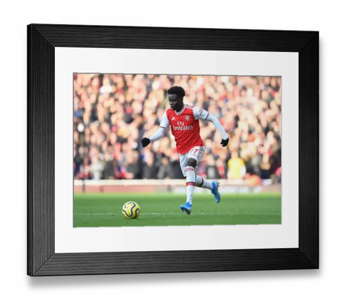 Framed Print : Arsenal's Bukayo Saka in Action Against Chelsea in the Premier League