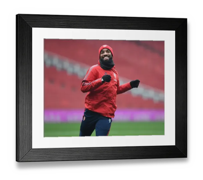 Framed Print : Arsenal's Alex Lacazette Prepares for Manchester United Clash in Premier League Showdown