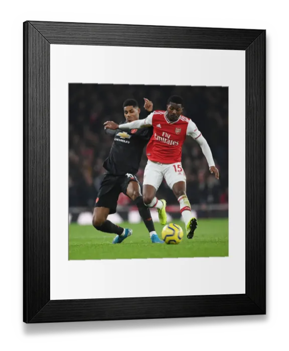 Framed Print : Arsenal vs Manchester United: Ainsley Maitland-Niles vs Marcus Rashford Clash in Premier League Showdown Framed Print : Arsenal vs Manchester United: Ainsley Maitland-Niles vs Marcus Rashford Clash in Premier League Showdown