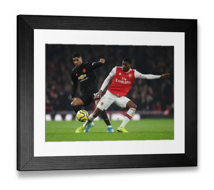 Framed Print : Clash of the Wings: Maitland-Niles vs Rashford in Arsenal vs Manchester United Premier League Showdown