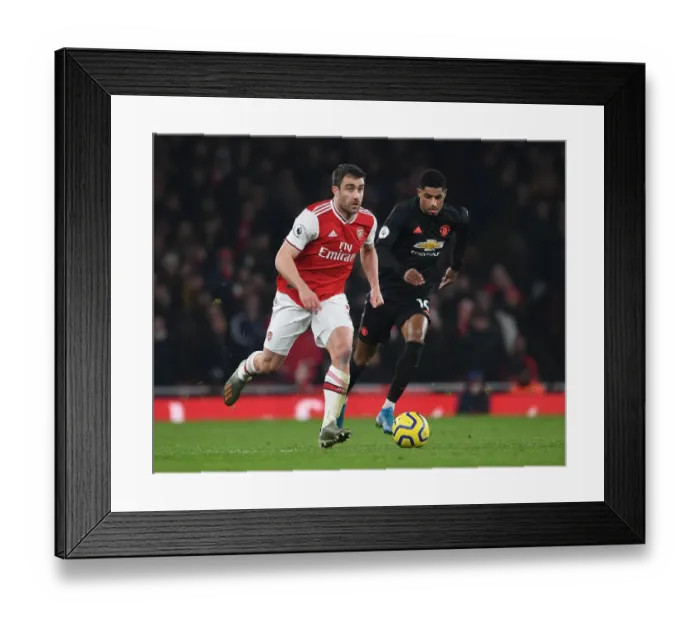 Framed Print : Arsenal's Sokratis Battles Past Rashford in Intense Arsenal v Manchester United Clash (2019-20) Framed Print : Arsenal's Sokratis Battles Past Rashford in Intense Arsenal v Manchester United Clash (2019-20)