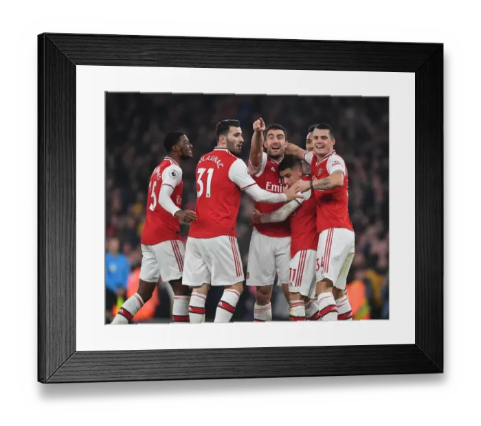 Framed Print : Arsenal's Sokratis, Kolasinac, Xhaka, and Torreira Celebrate Goals Against Manchester United (January 2020)