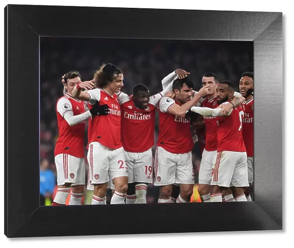 Arsenal Double Over Manchester United: Sokratis, Ozil, Luiz, Maitland-Niles, Aubameyang, Lacazette, and Xhaka Celebrate Glorious Victory (January 2020)
