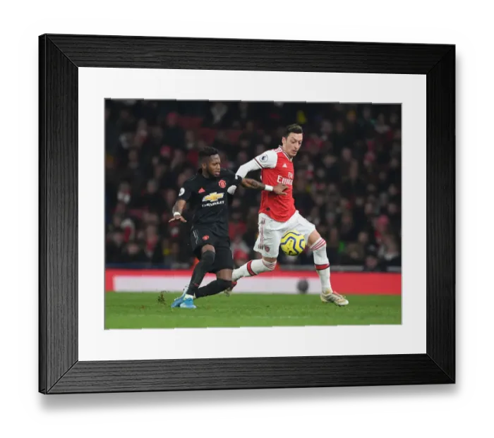 Framed Print : Mesut Ozil Outsmarts Fred: Arsenal's Masterclass vs Manchester United Framed Print : Mesut Ozil Outsmarts Fred: Arsenal's Masterclass vs Manchester United