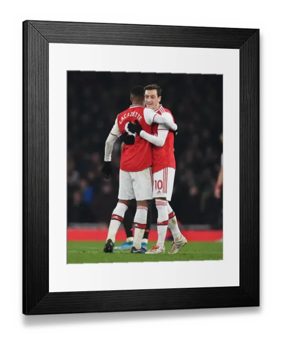 Framed Print : Arsenal's Lacazette and Ozil Clash With Manchester United in Premier League Showdown (2019-20) Framed Print : Arsenal's Lacazette and Ozil Clash With Manchester United in Premier League Showdown (2019-20)