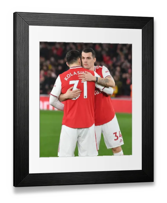 Framed Print : Arsenal FC: Kolasinac and Xhaka's United Moment before the Premier League Clash (2019-20) Framed Print : Arsenal FC: Kolasinac and Xhaka's United Moment before the Premier League Clash (2019-20)