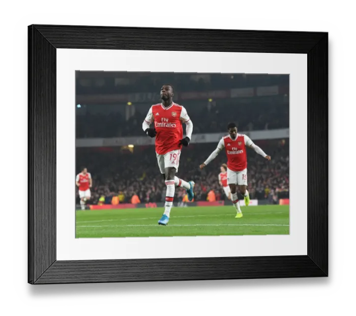 Framed Print : Nicolas Pepe's Stunner: Arsenal's Opening Goal vs Manchester United (2019-20) Framed Print : Nicolas Pepe's Stunner: Arsenal's Opening Goal vs Manchester United (2019-20)