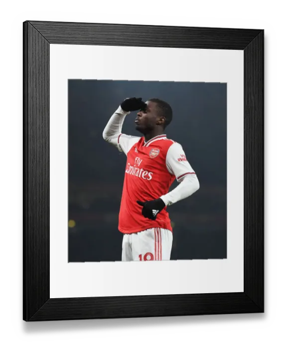 Framed Print : Nicolas Pepe's Stunning Opener: Arsenal Takes the Lead Against Manchester United (2019-20)