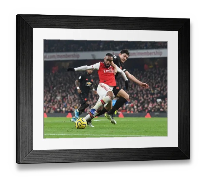 Framed Print : Arsenal's Lacazette vs. Maguire: A Premier League Rivalry Ignites - Arsenal vs. Manchester United Framed Print : Arsenal's Lacazette vs. Maguire: A Premier League Rivalry Ignites - Arsenal vs. Manchester United
