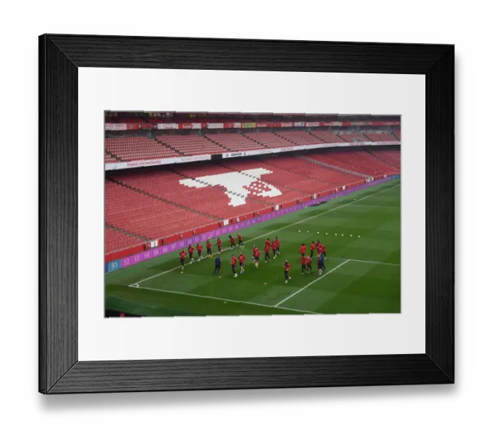 Framed Print : Arsenal vs Manchester United: Premier League Showdown - The Arsenal Squad Prepares at Emirates Stadium