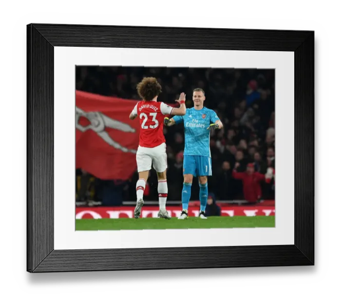 Framed Print : Arsenal's Double Victory: Luiz and Leno Celebrate Goals Against Manchester United (2019-20)