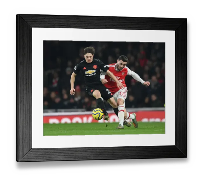 Framed Print : Arsenal vs Manchester United: Sead Kolasinac vs Daniel James - Premier League Clash at Emirates Stadium Framed Print : Arsenal vs Manchester United: Sead Kolasinac vs Daniel James - Premier League Clash at Emirates Stadium