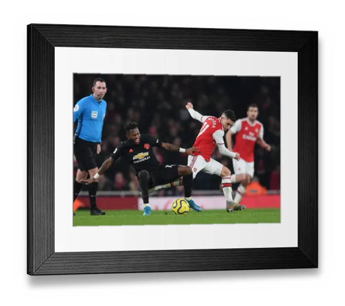 Framed Print : Arsenal vs Manchester United: Torreira vs Fred - Intense Battle in the Premier League (2019-20) Framed Print : Arsenal vs Manchester United: Torreira vs Fred - Intense Battle in the Premier League (2019-20)