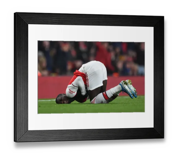 Framed Print : Pepe vs Manchester United: Arsenal Star Clashes in Premier League Showdown Framed Print : Pepe vs Manchester United: Arsenal Star Clashes in Premier League Showdown