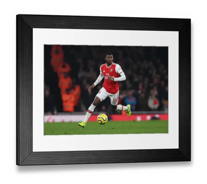 Framed Print : Arsenal's Ainsley Maitland-Niles Faces Manchester United in Premier League Showdown (2019-20) Framed Print : Arsenal's Ainsley Maitland-Niles Faces Manchester United in Premier League Showdown (2019-20)