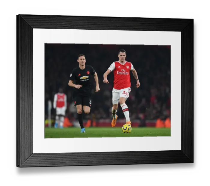 Framed Print : Arsenal vs Manchester United: Xhaka vs Matic Clash in Premier League Showdown