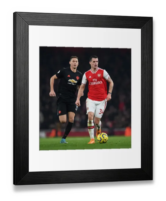 Framed Print : Clash of Midfield Titans: Xhaka vs Matic in Arsenal vs Manchester United Premier League Battle Framed Print : Clash of Midfield Titans: Xhaka vs Matic in Arsenal vs Manchester United Premier League Battle