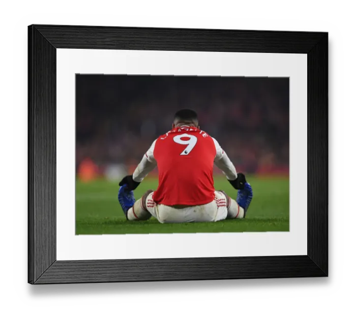 Framed Print : Arsenal's Alexandre Lacazette Faces Off Against Manchester United in Premier League Showdown Framed Print : Arsenal's Alexandre Lacazette Faces Off Against Manchester United in Premier League Showdown