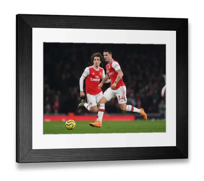 Framed Print : Granit Xhaka in Action: Arsenal vs Manchester United, Premier League 2019-20