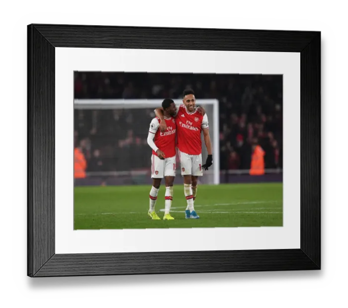 Framed Print : Arsenal's Aubameyang and Maitland-Niles Celebrate Victory Over Manchester United (2019-20) Framed Print : Arsenal's Aubameyang and Maitland-Niles Celebrate Victory Over Manchester United (2019-20)