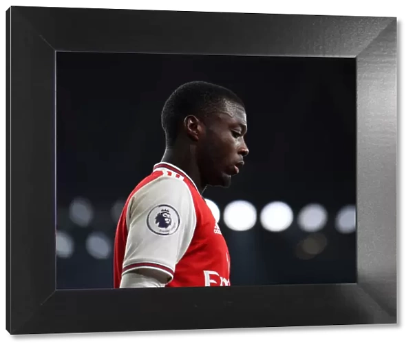 Arsenal's Nicolas Pepe Goes Head-to-Head with Manchester United in Premier League Clash