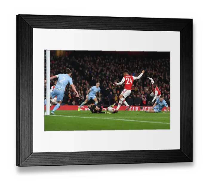 Framed Print : Arsenal's Reiss Nelson Scores in FA Cup Third Round Victory over Leeds United