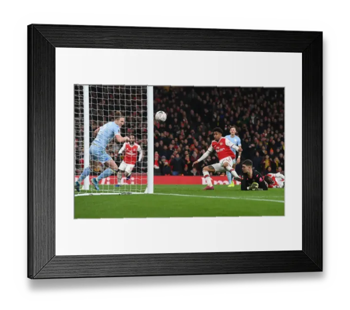 Framed Print : Arsenal's Reiss Nelson Scores the Winner Against Leeds United in FA Cup Third Round
