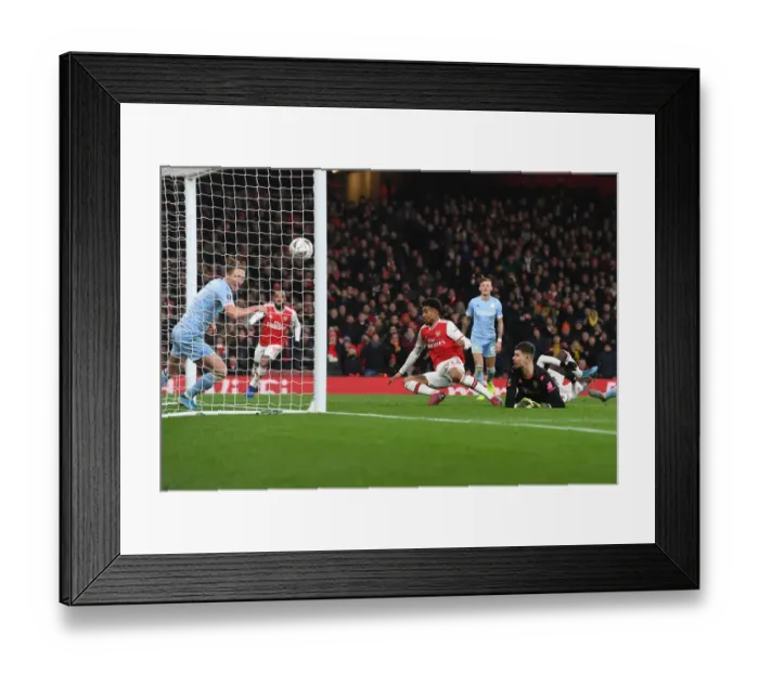Framed Print : Reiss Nelson Scores FA Cup-Winning Goal for Arsenal vs Leeds United