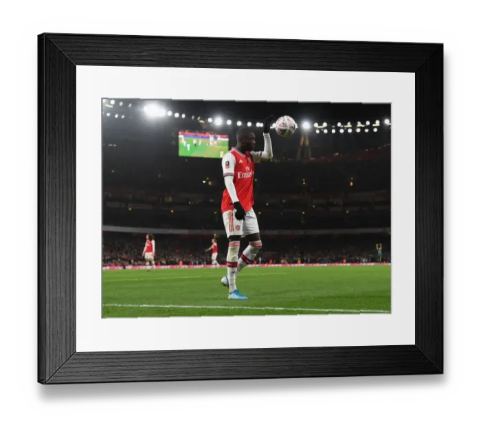 Framed Print : Arsenal's Nicolas Pepe in Action against Leeds United in FA Cup Third Round