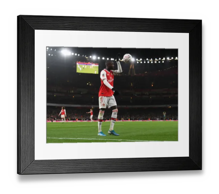 Framed Print : Arsenal's Nicolas Pepe in Action: FA Cup Clash Against Leeds United Framed Print : Arsenal's Nicolas Pepe in Action: FA Cup Clash Against Leeds United