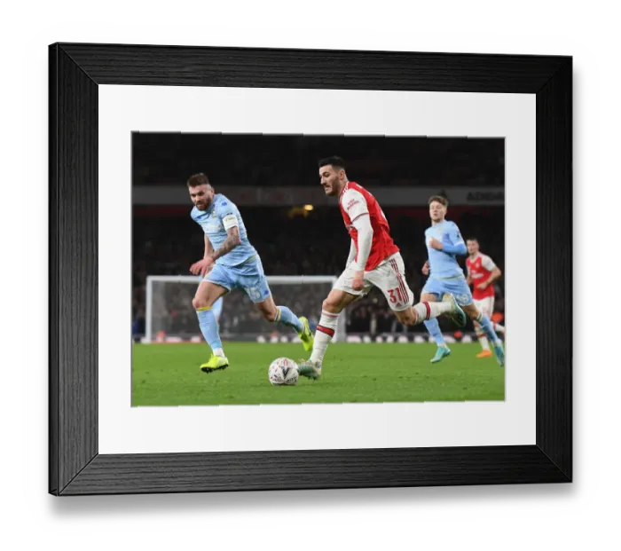 Framed Print : Arsenal's Sead Kolasinac Breaks Past Leeds Stuart Dallas in FA Cup Clash