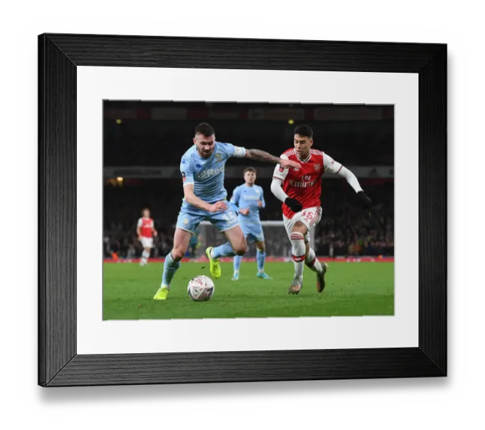 Framed Print : Arsenal vs Leeds United: FA Cup Clash - Martinelli vs Dallas Framed Print : Arsenal vs Leeds United: FA Cup Clash - Martinelli vs Dallas
