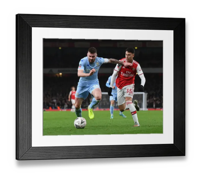 Framed Print : Martinelli vs Dallas: FA Cup Battle at Emirates Stadium - Arsenal vs Leeds United