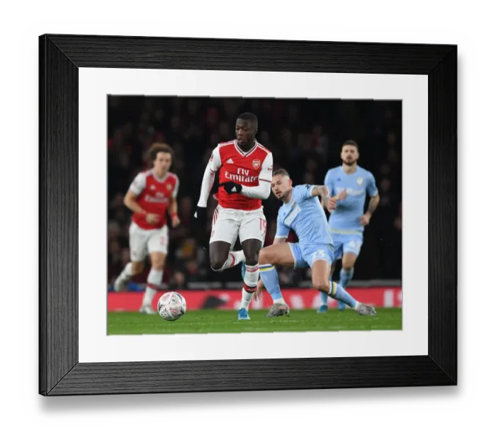 Framed Print : Arsenal vs Leeds United: FA Cup Third Round Battle at Emirates Stadium
