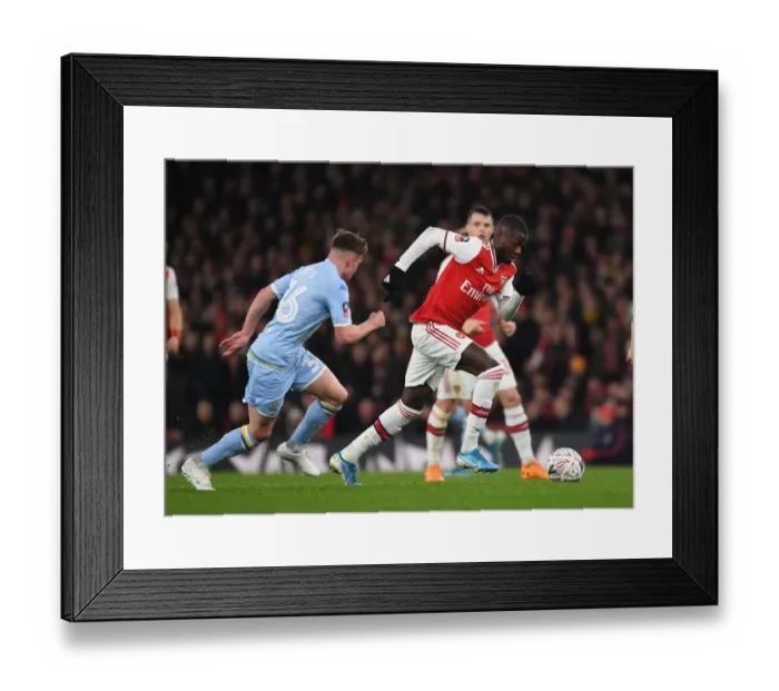 Framed Print : Arsenal vs Leeds United: FA Cup Battle at Emirates Stadium