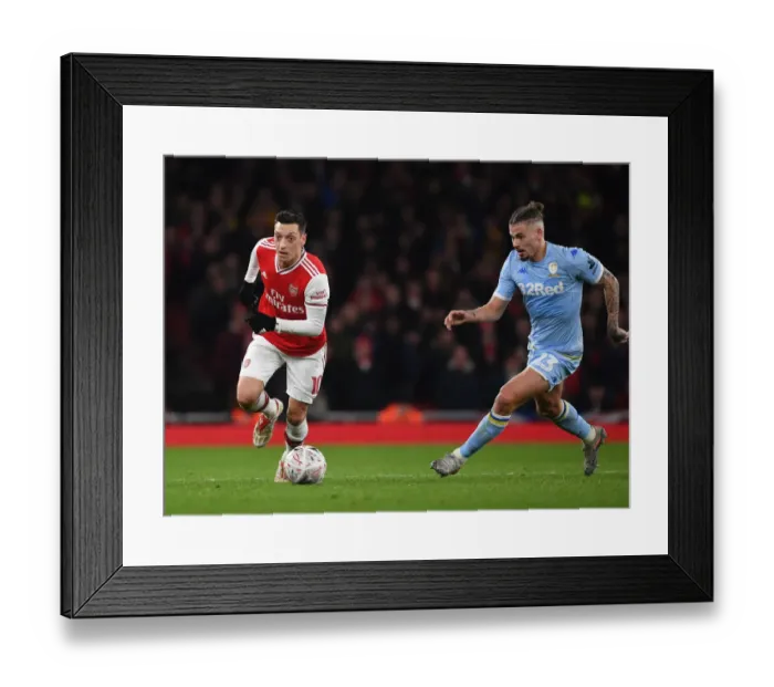 Framed Print : Mesut Ozil's Magic: Outsmarting Phillips in Arsenal's FA Cup Victory over Leeds