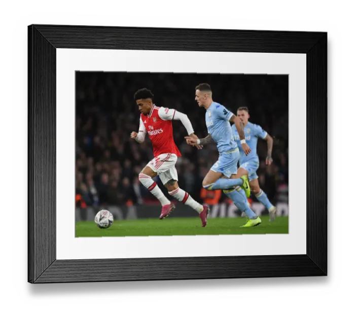 Framed Print : Arsenal vs Leeds United: FA Cup Third Round Clash at Emirates Stadium Framed Print : Arsenal vs Leeds United: FA Cup Third Round Clash at Emirates Stadium